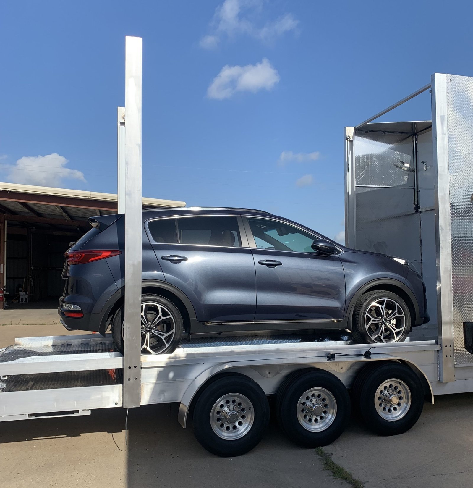 Vehicle loading specialty trailer