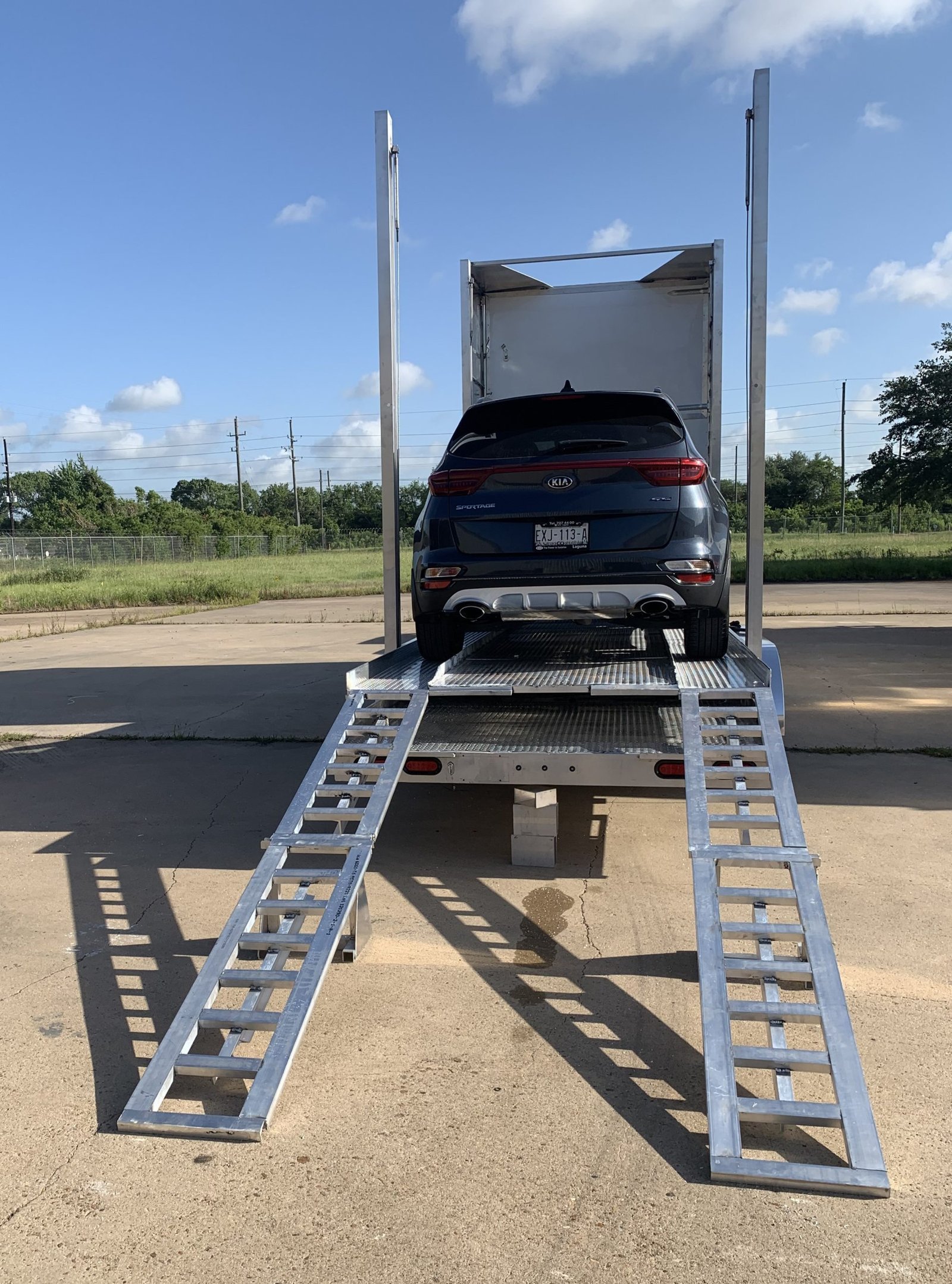 Vehicle loading specialty trailer